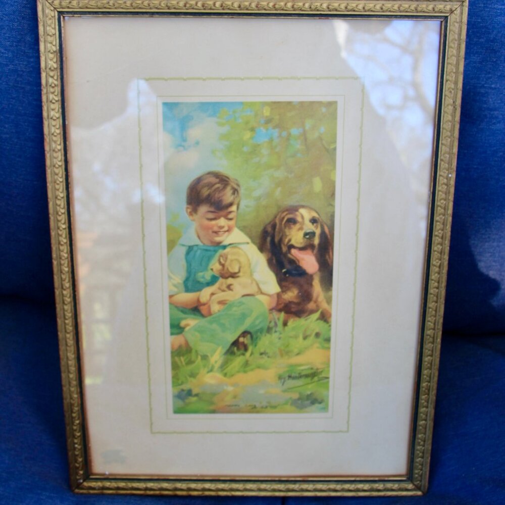 Vintage print of boy and his dog in wooden frame
